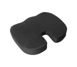 Viscoelastic cushion with coccyx discharge