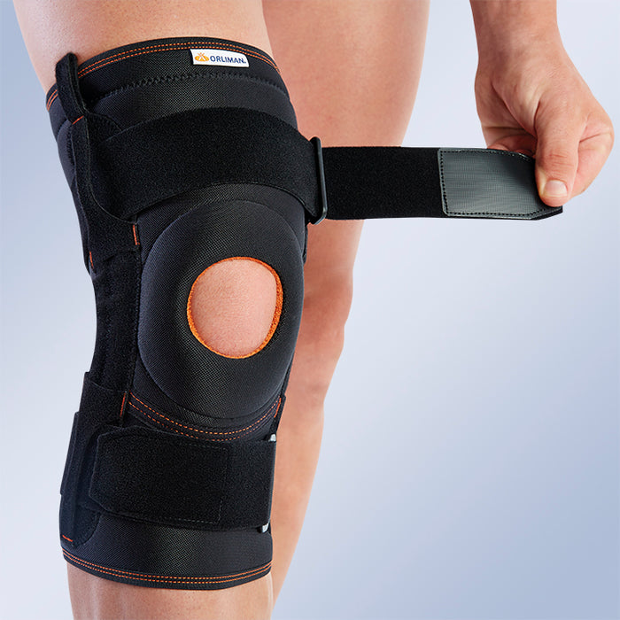 Knee brace with flexible side stabilizers - ORLIMAN